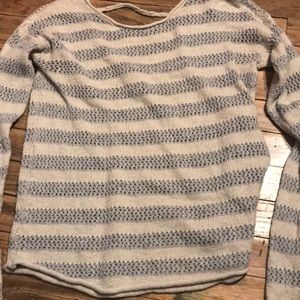 Knit sweater.